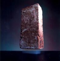 A 2.5 kg brick is supported on top of a piece of aerogel weighing only 2 grams. Source: NASA Stardust